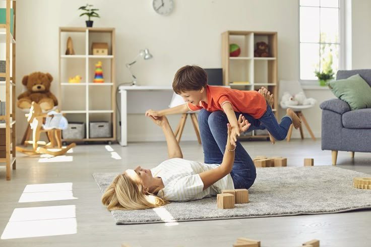 Child playing with her mother in home